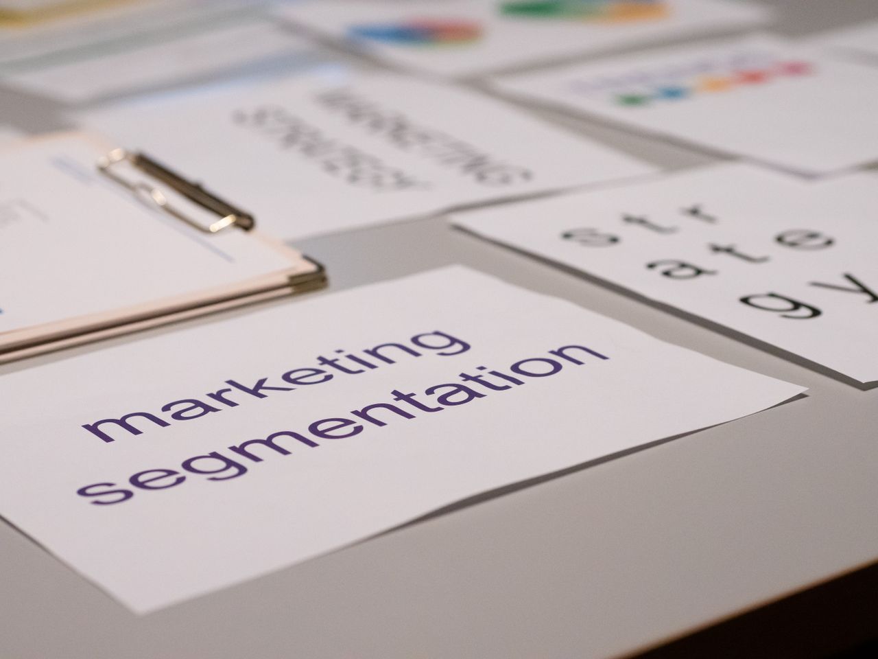 digital Close-up of various marketing documents on a desk, perfect for business and strategy discussions.